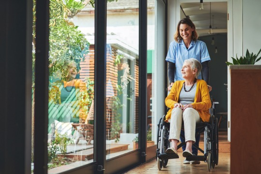 ACRL - Nurse and older woman in wheelchair 540x360